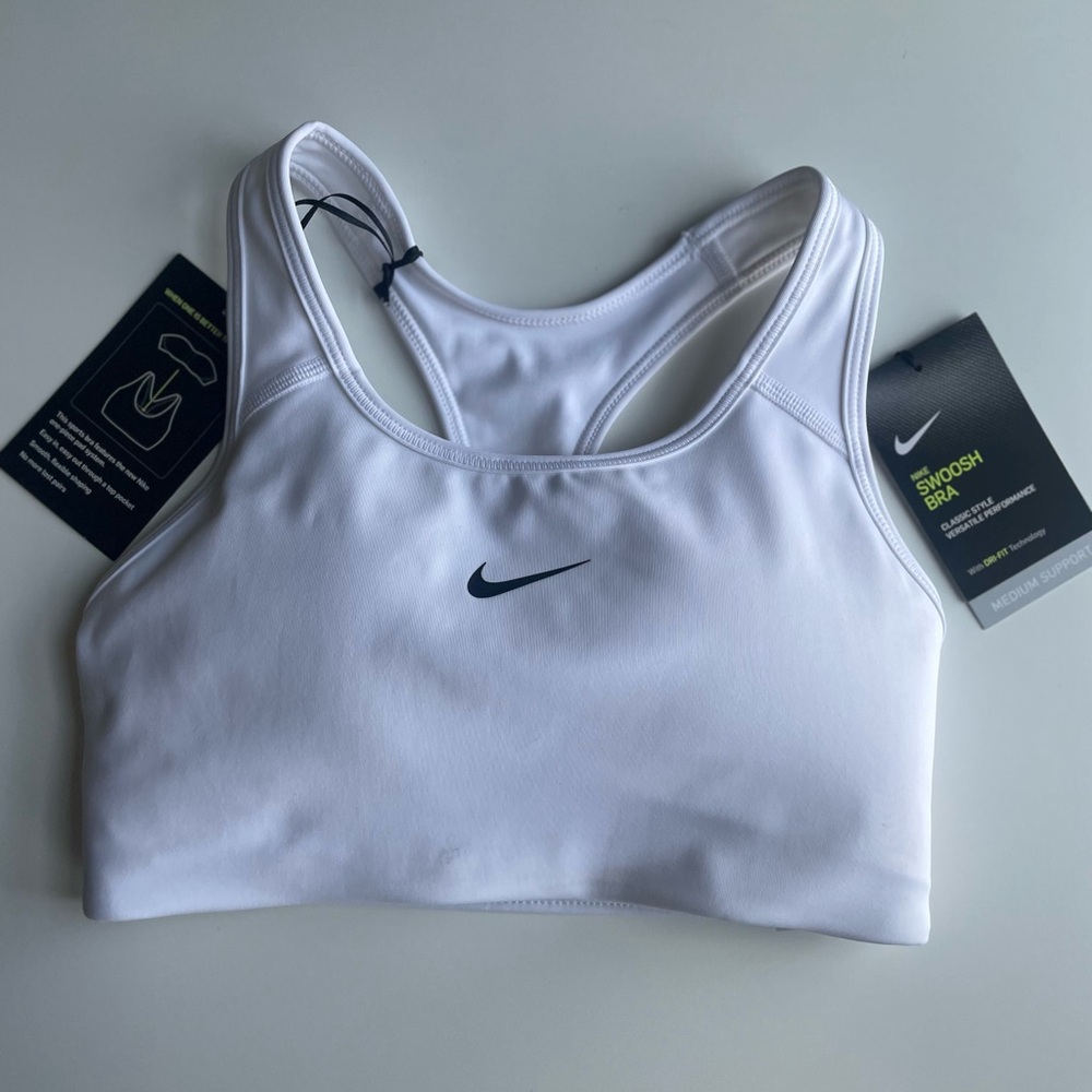 BRAND NEW.  XS Nike Swoosh Bra, white, sports bra.